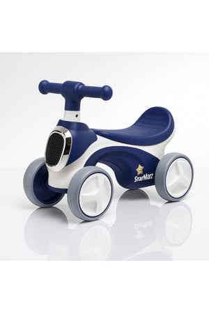StarMarz Baby Balance Bike – 4-Wheel Toddler Training Bike with Soft Seat, Easy-Grip Handlebar & Silent Wheels – Indoor/Outdoor Ride-On for Babies (10–36 Months) – Blue & White
